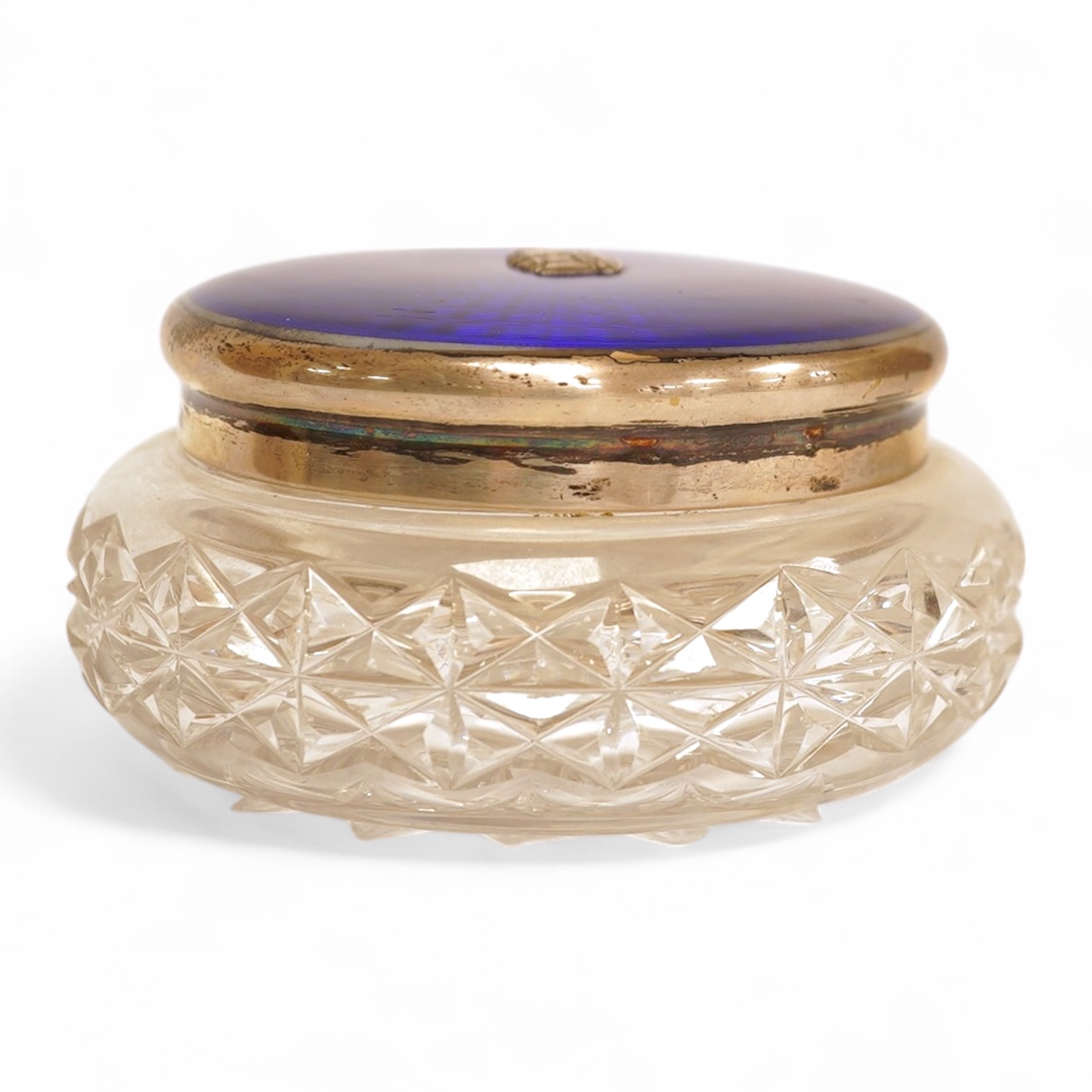 A George VI silver and enamel lidded circular glass powder bowl, John William Barrett, Birmingham, 1939, diameter 12.2cm.